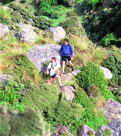 Outdoor enthusiasts enjoying some of the rugged hill walking Canterbury has to offer.