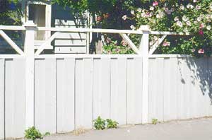 A simple but interesting medium-height fence and planting give these residents privacy from the street