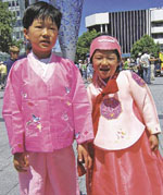 Five-year-old Jasmine Rou and her big brother Justin (7) joined a large crowd in Cathedral Square on 20 November for a celebration of Korean culture. Jasmine and Justin go to Merrin School.