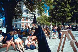 The Wizard talking in the square
