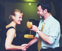 Garry Moore presented the supreme award to Trudy Burgess, accepting on behalf of the St Martins New World Supermarket, at Christchurch Environment Centre's inaugural Green Heart Awards last month.  The awards have been established to reward businesses which are working extra hard to implement ecologically sustainable activities. Highly commended were Lucas Associates, Trees for Canterbury, Trucost Ltd, and Whisper Tech.