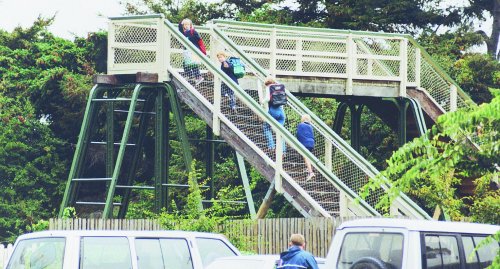 'Bye Mum!'  'Bye Dad!'  Children on their way to school, via the renovated Waimairi School overbridge.