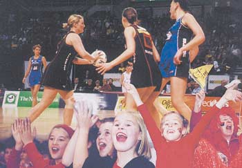 Young fans get behind their Canterbury Flames netballers at a recent match at the Councils WestpacTrust Centre. The Flames made the venue their home court for the winter netball season, and immediately increased crowd numbers by more than 1000.