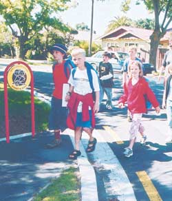 Beckenham school children ourneying to school via a Safe Routes to School Crossing Point.